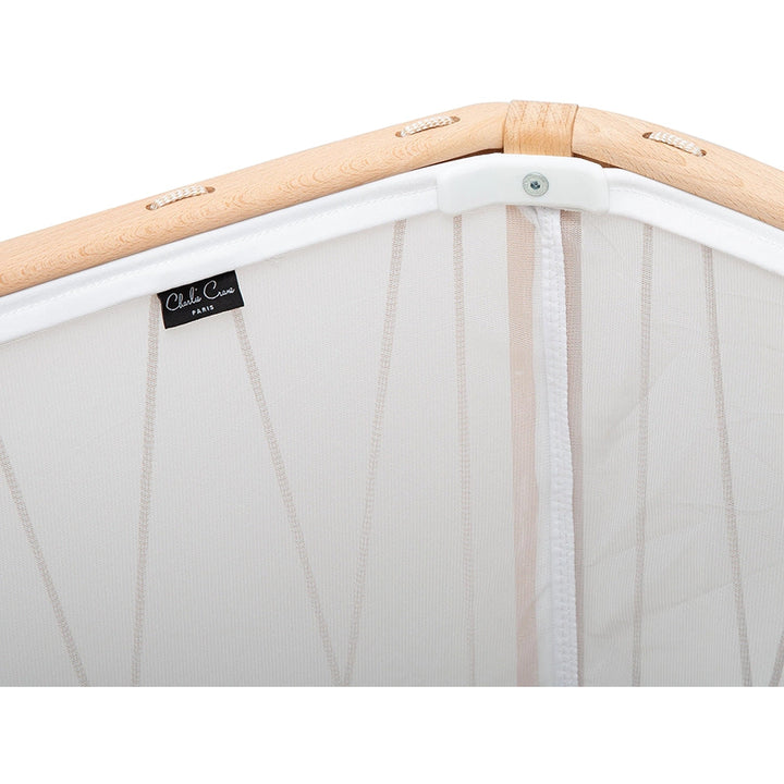 Lichen crib vignette highlights the KIMI Evolving Baby Bed Charlie Crane designed to grow with child