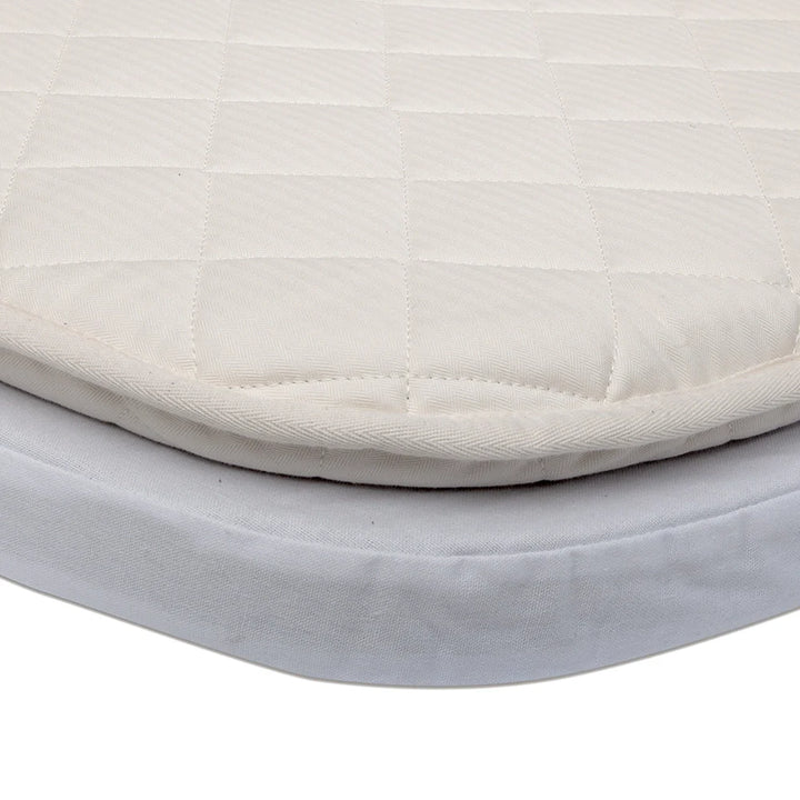 Desert nursery shot presents the KIMI Evolving Bed Charlie Crane with organic, safe design for infants