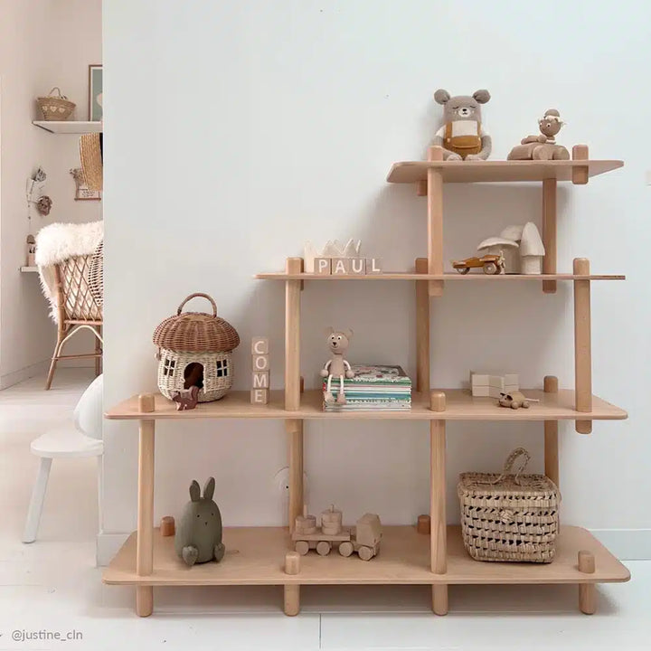 Soft light emphasizes the Charlie Crane FILO Bookshelf in natural styled as minimalist nursery decor