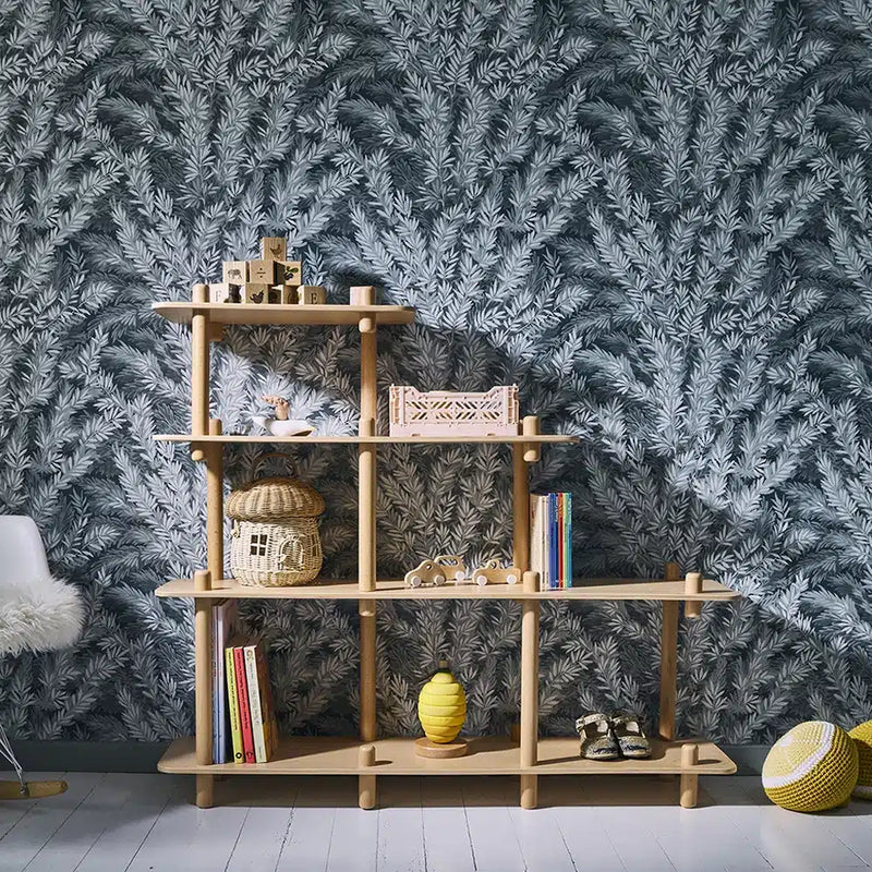 Child friendly shelving solution frames the Charlie Crane FILO Bookshelf in natural designed for baby spaces