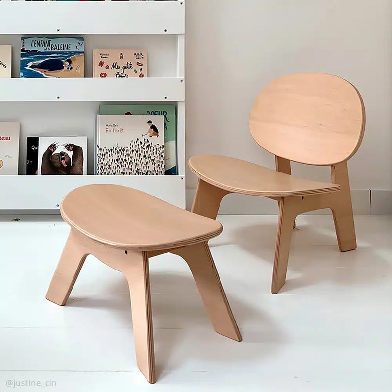 Playful nursery scene shows the Wooden HIBO Chair by Charlie Crane in natural designed as an infant safe chair