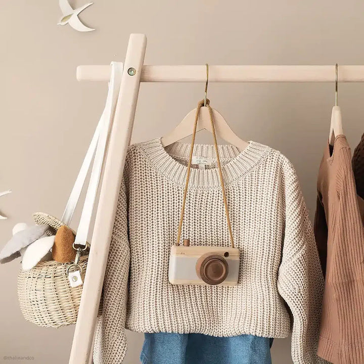 Minimal home setting frames the Charlie Crane HOMI Rack in natural as refined minimalist nursery decor