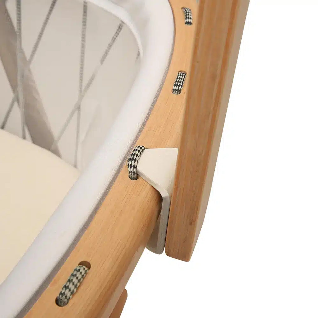 Child friendly setup presents the Charlie Crane Wooden KANO Bed Arrow in natural ideal for crib canopy use
