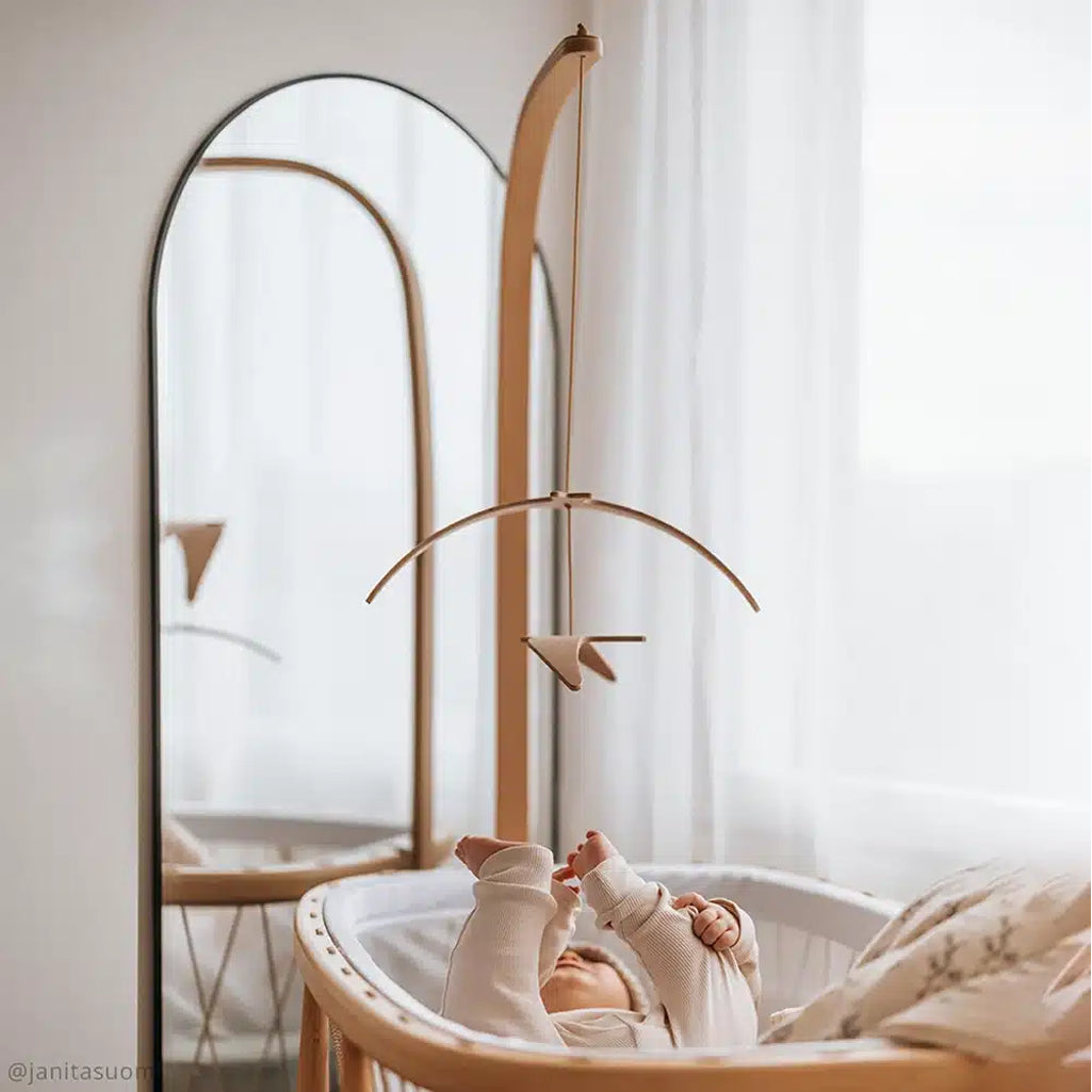 Elegant bedroom vignette highlights the KANO Bed by Charlie Crane in natural with a natural finish