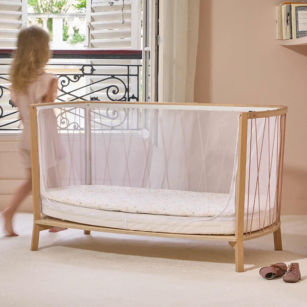 Modern nursery accent presents the Baby KIMI Evolving Bed by Charlie Crane in lichen as a sophisticated crib daybed