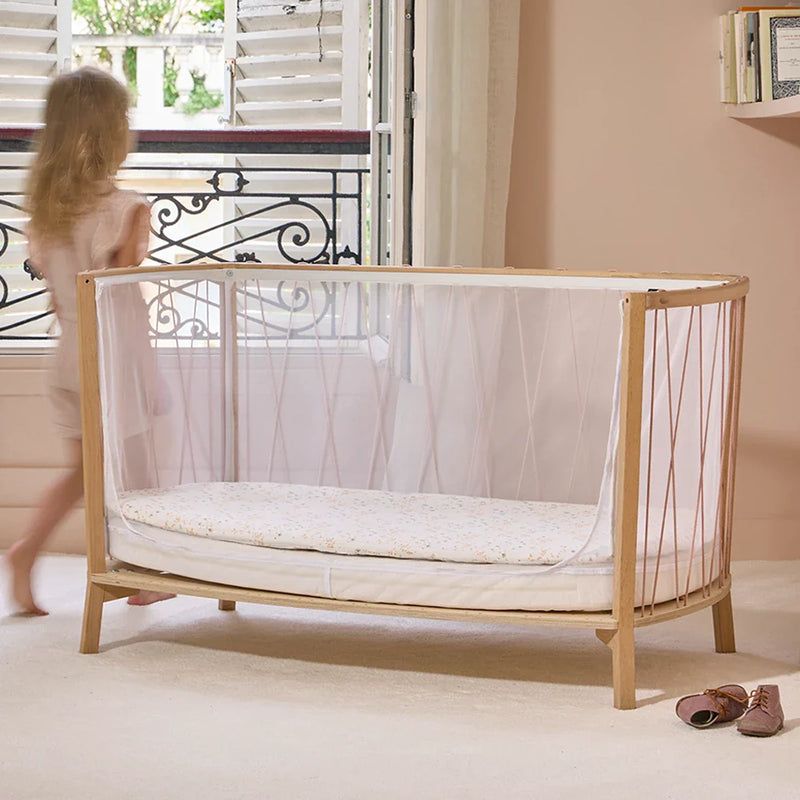 Modern nursery accent presents the Baby KIMI Evolving Bed by Charlie Crane in lichen as a sophisticated crib daybed