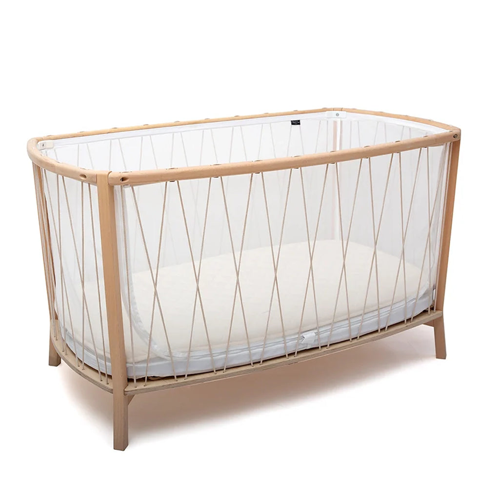 Child ready setup features the Charlie Crane KIMI Baby Bed Evolving in bois de rose designed to transition from crib to daybed