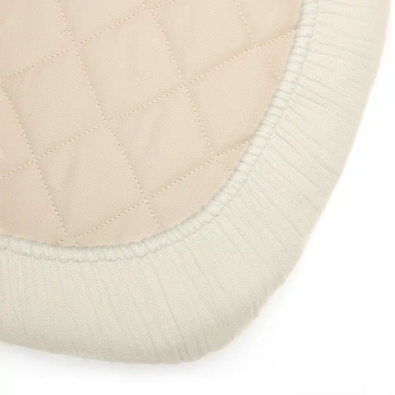 Elisabeth nursery detail displays the KIMI Evolving Bed Charlie Crane with minimalist fitted sheet for newborn comfort