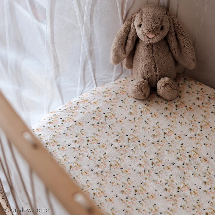 Milk nursery styling highlights the Charlie Crane KIMI Bed Evolving with a minimalist fitted sheet for baby safety
