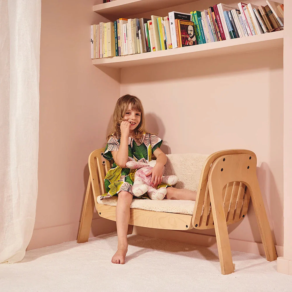 Adaptable furniture view highlights the Charlie Crane Cord KIMI natural crib to bench concept