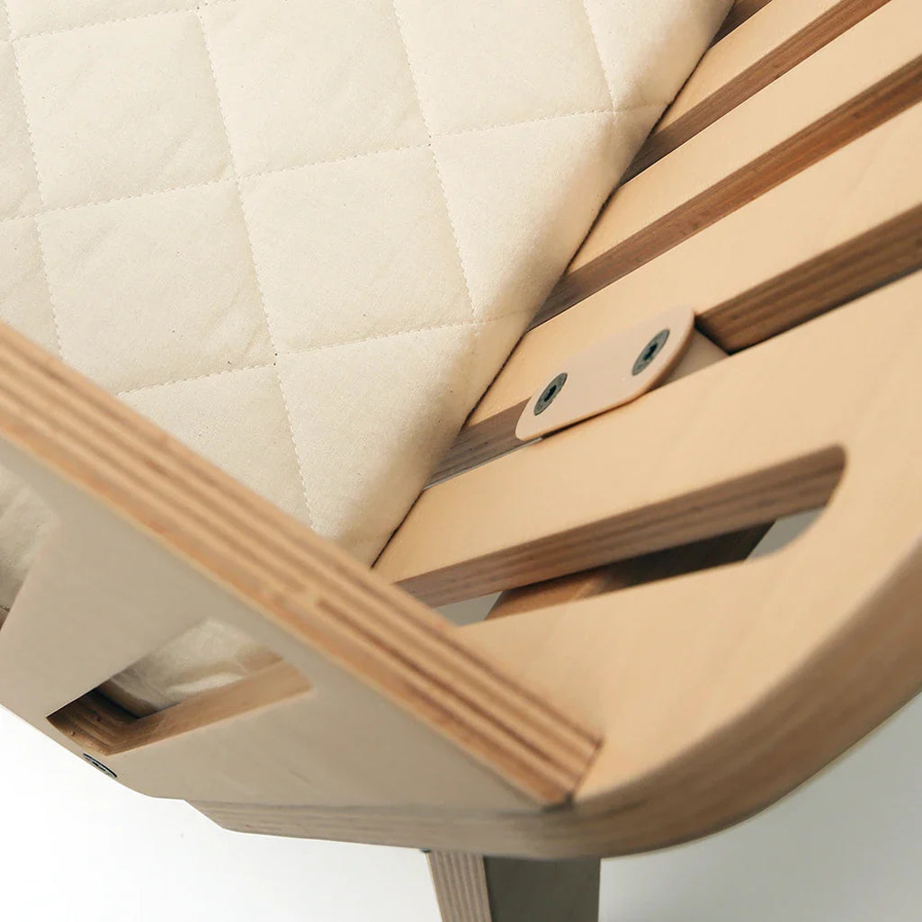Modern baby room displays the Charlie Crane Cord KIMI natural option designed for baby use