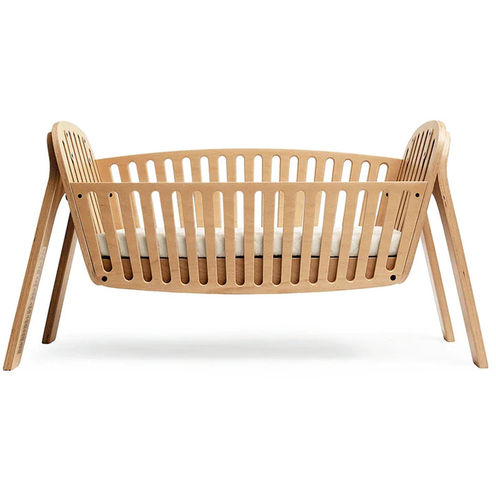 Thoughtful nursery decor centers on the KIMI Cord Charlie Crane in natural for infant comfort