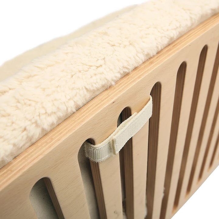 cushion for charlie crane kodo crib strapped onto bench