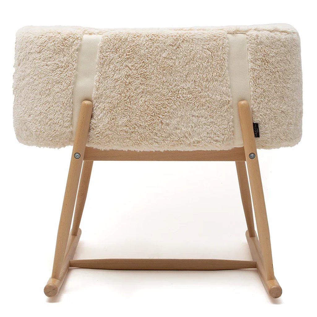 Gentle rocking view features the Charlie Crane Bassinet KUKO in camel as an infant safe choice