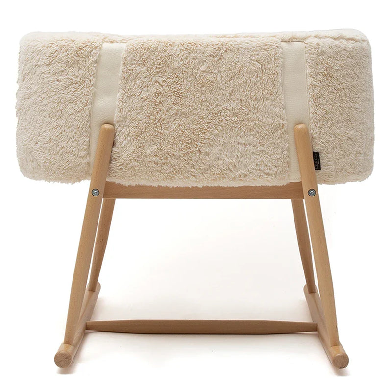 Gentle rocking view features the Charlie Crane Bassinet KUKO in camel as an infant safe choice