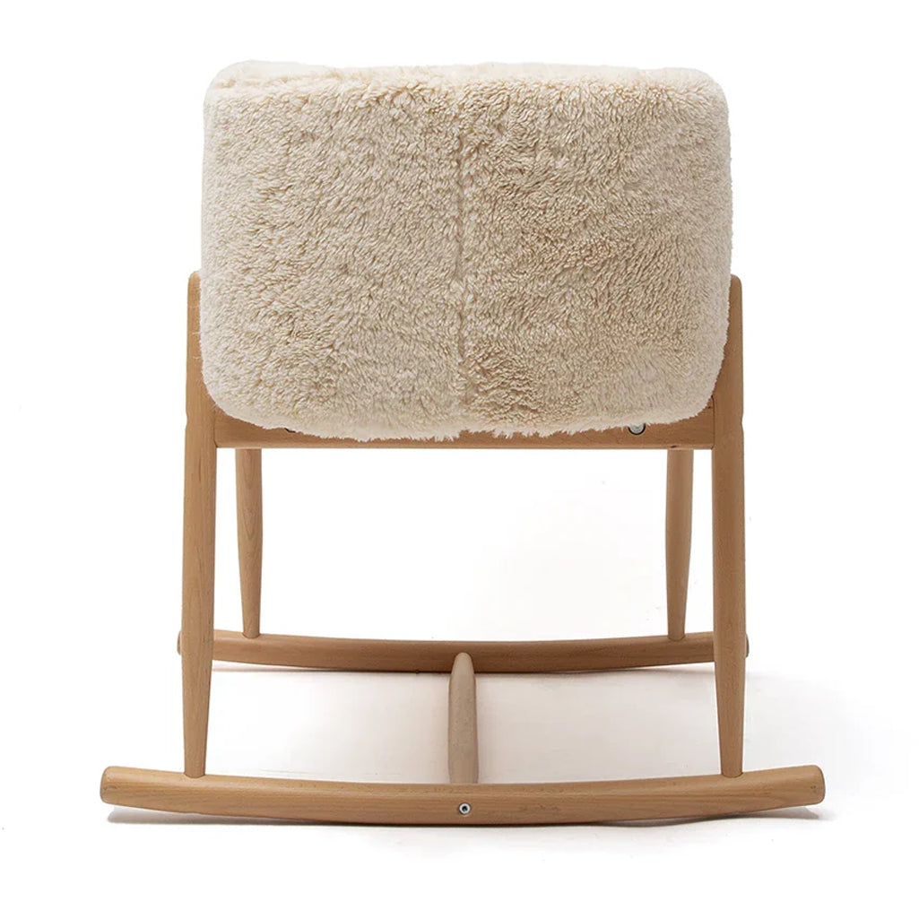 Peaceful infant area shows the KUKO Bassinet Charlie Crane in farrow designed for baby comfort