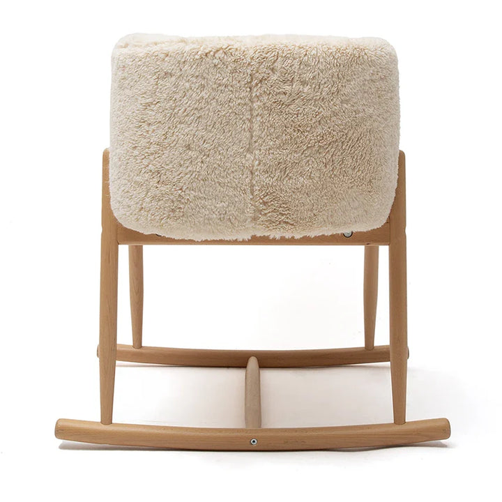 Peaceful infant area shows the KUKO Bassinet Charlie Crane in farrow designed for baby comfort