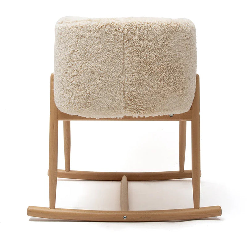 Peaceful infant area shows the KUKO Bassinet Charlie Crane in farrow designed for baby comfort