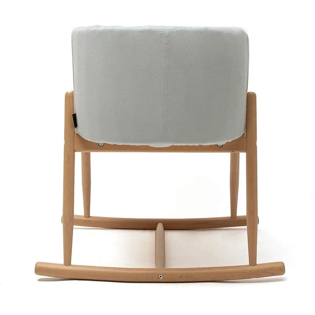 Minimal home scene includes the Bassinet KUKO Charlie Crane in camel for minimalist living