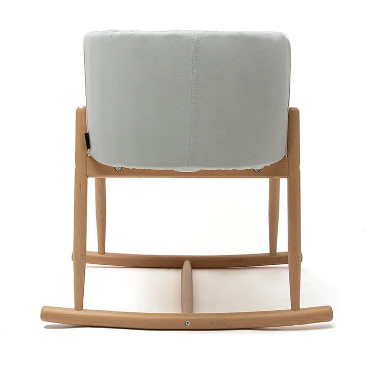 Minimal home scene includes the Bassinet KUKO Charlie Crane in camel for minimalist living