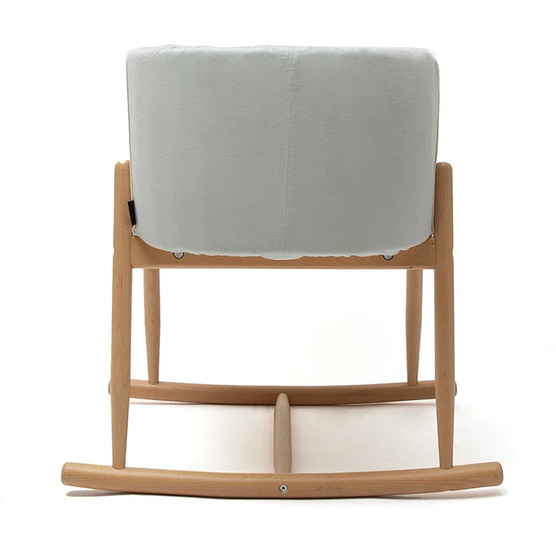 Minimal home scene includes the Bassinet KUKO Charlie Crane in camel for minimalist living