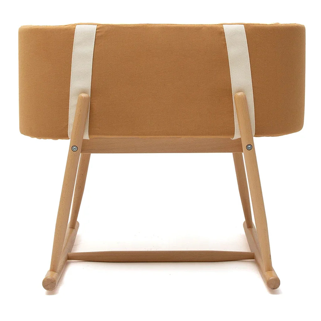 Calm baby corner displays the Charlie Crane KUKO Bassinet farrow with a sophisticated feel