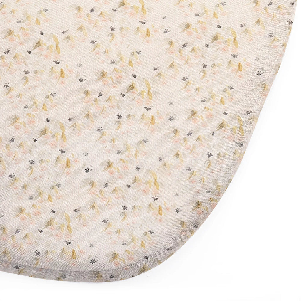 Soft bassinet bedding shows the Charlie Crane KUMI and KUKO Fitted Sheet in pearl blossom with organic comfort