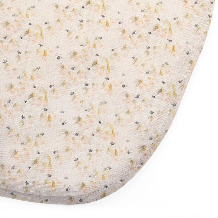 Soft bassinet bedding shows the Charlie Crane KUMI and KUKO Fitted Sheet in pearl blossom with organic comfort
