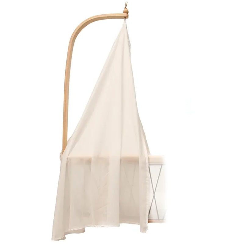 Refined nursery corner features the Charlie Crane KUMI Canopy pia inspired by midcentury modern design