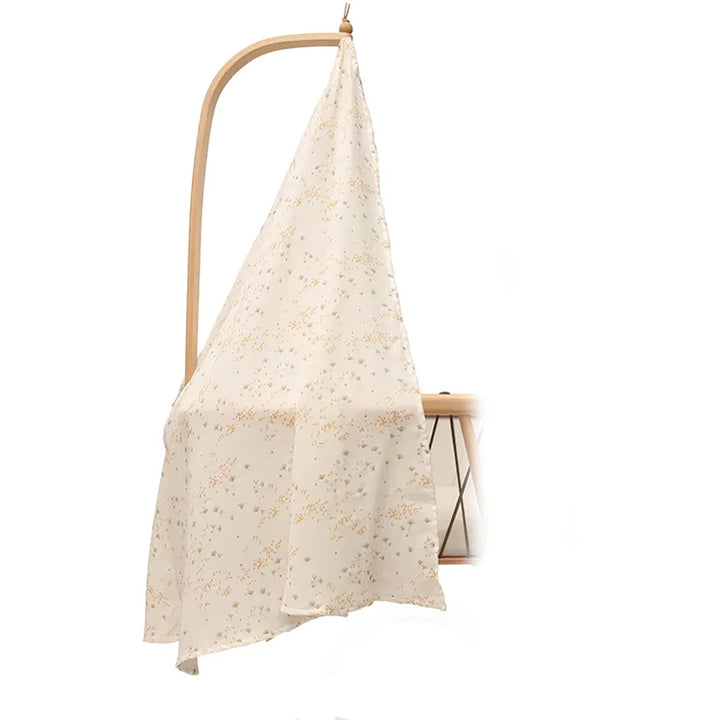 Soft cotton texture shows the KUMI Canopy Charlie Crane white made with organic fabric