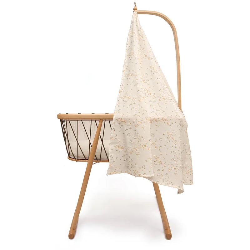 Serene infant space frames the Charlie Crane KUMI Canopy in pia as calming nursery decor
