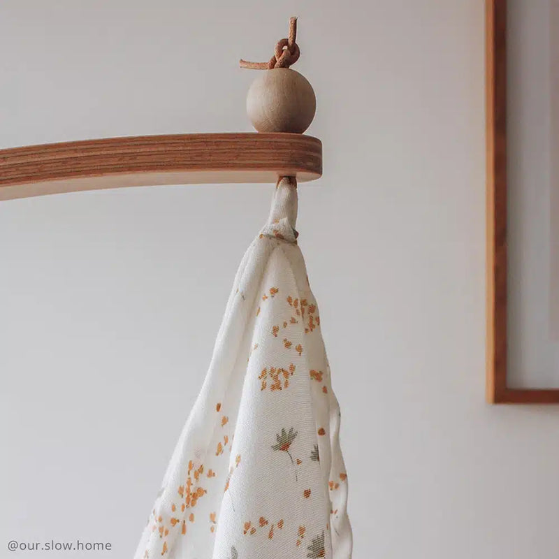 Gentle fabric drape shows the KUMI Canopy by Charlie Crane in white with minimalist style