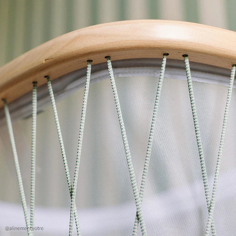 Serene infant room features the KUMI Cradle Charlie Crane in desert with sustainable craftsmanship