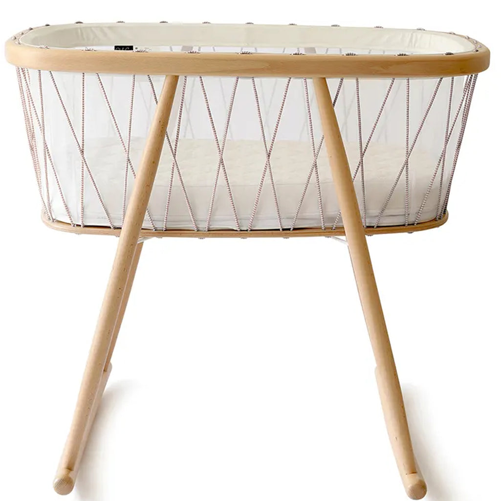 Natural wood profile shows the KUMI Cradle Charlie Crane in desert with organic materials