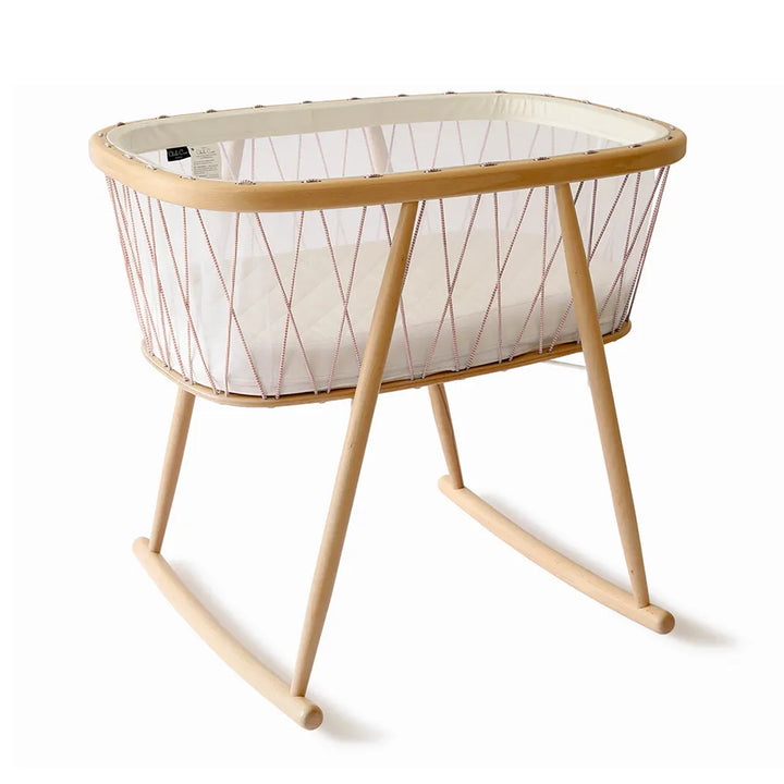 Side angle detail highlights the Charlie Crane KUMI Cradle bois de rose with organic materials