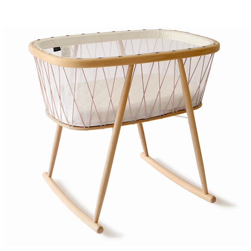 Side angle detail highlights the Charlie Crane KUMI Cradle bois de rose with organic materials