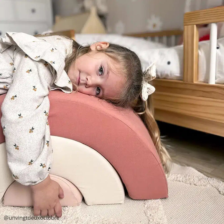 Classic design detail captures the Charlie Crane MILO Wooden Rainbow in farrow as elegant nursery decor