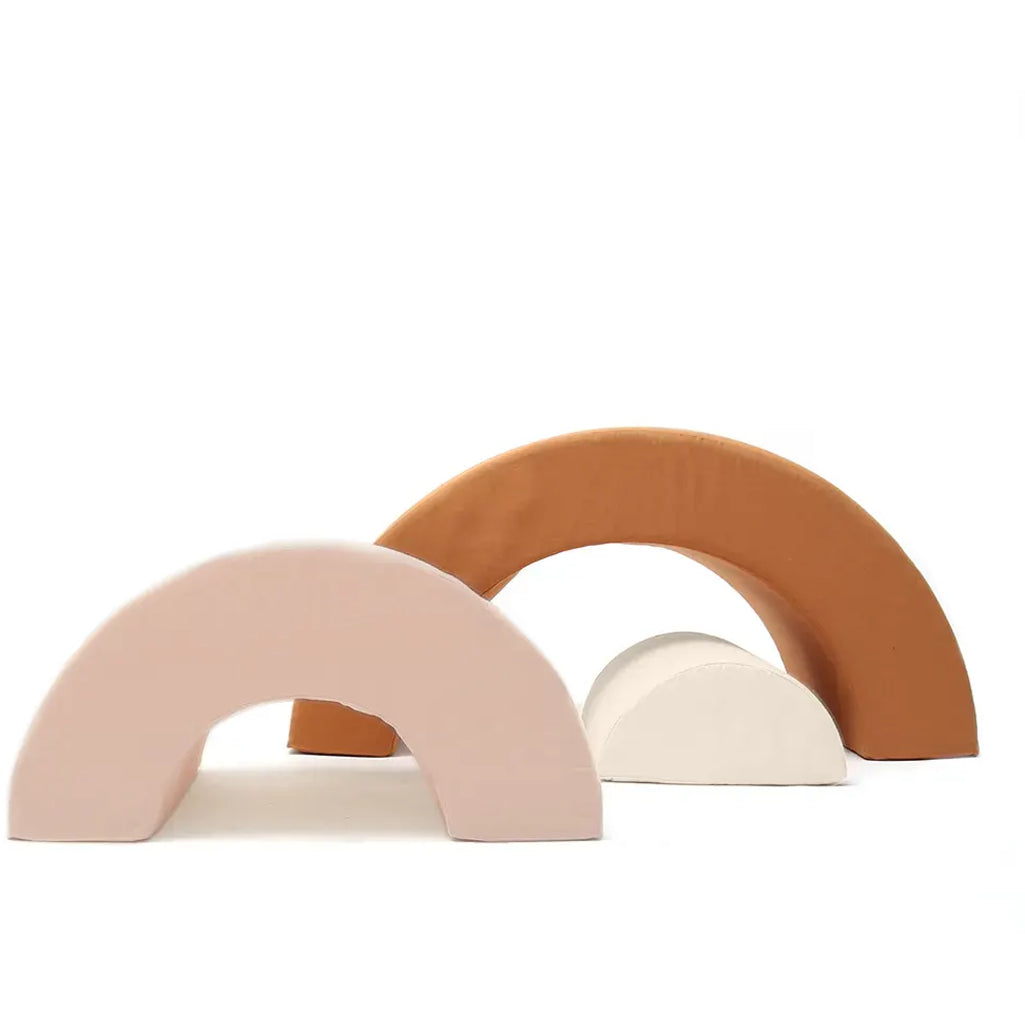 Curved rainbow form displays the Charlie Crane MILO Rainbow in farrow with an organic aesthetic