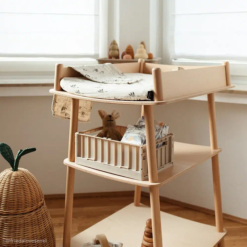 charlie crane pago changing diaper table and water proof mattress in boho natural nursery 