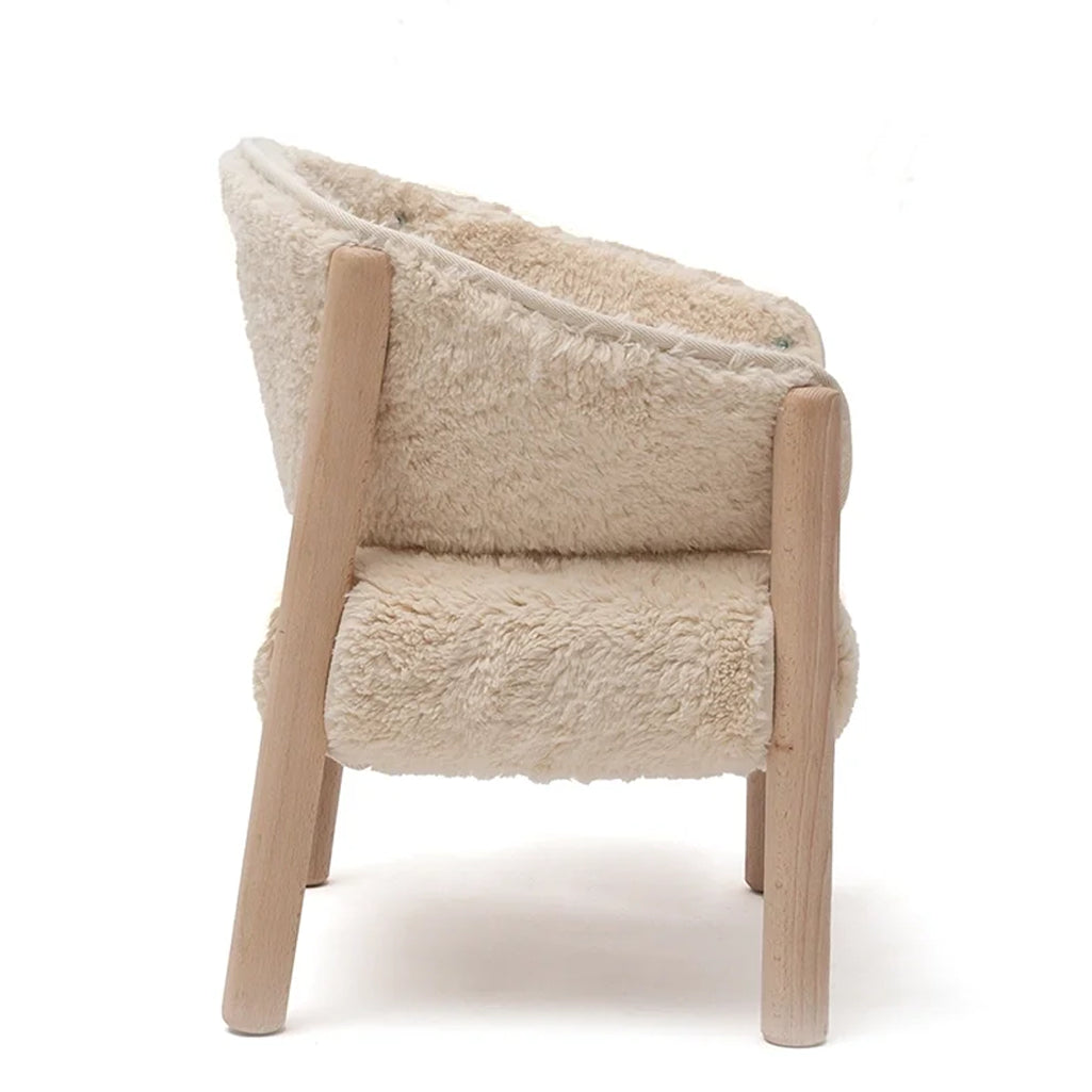 Clean interior styling presents the Charlie Crane SABO Fur Chair in milk with a refined French aesthetic