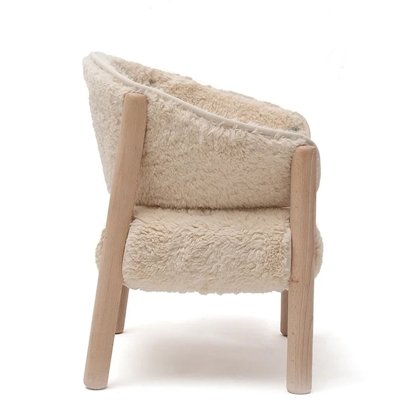 Clean interior styling presents the Charlie Crane SABO Fur Chair in milk with a refined French aesthetic