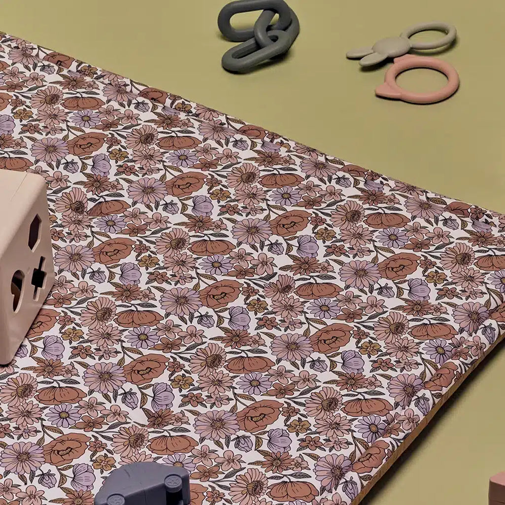 retro flowers charlie crane and mushie collaboration tami playmat and mushie bpa free silicone toys 