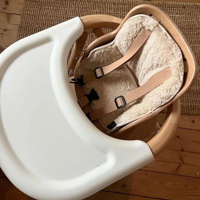 top view of charlie crane tobo high chair with milk fur baby seat cover 