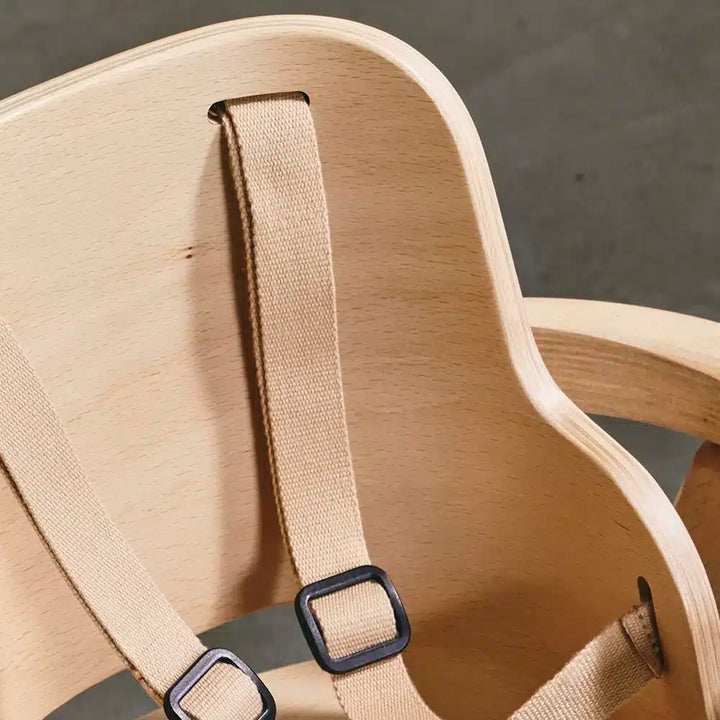 close up of details on charlie crane natural baby set for high chair with adjustable straps 