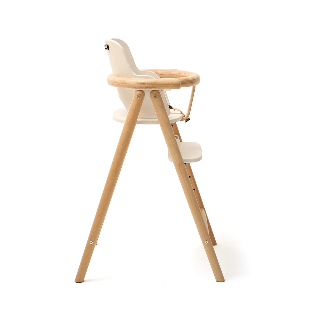 Side profile of the White TOBO high chair with Baby Set by Charlie Crane, modern wooden design