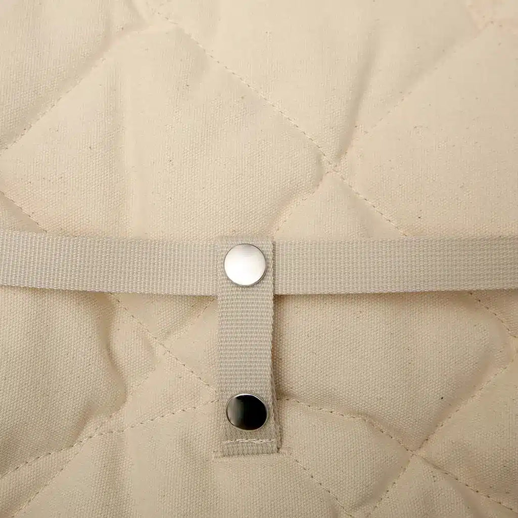 From above, the Walnut Wood Levo Rocker by Charlie Crane in mimosa shows its organic fabric and baby safe design