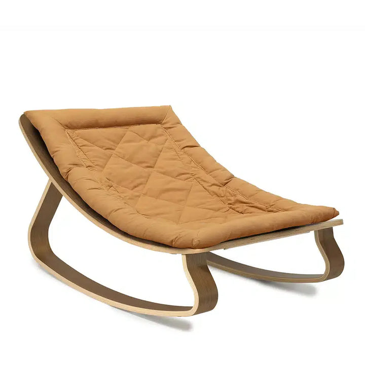 Balanced proportions of the Levo Rocker in walnut wood by Charlie Crane in camel support newborn safe use