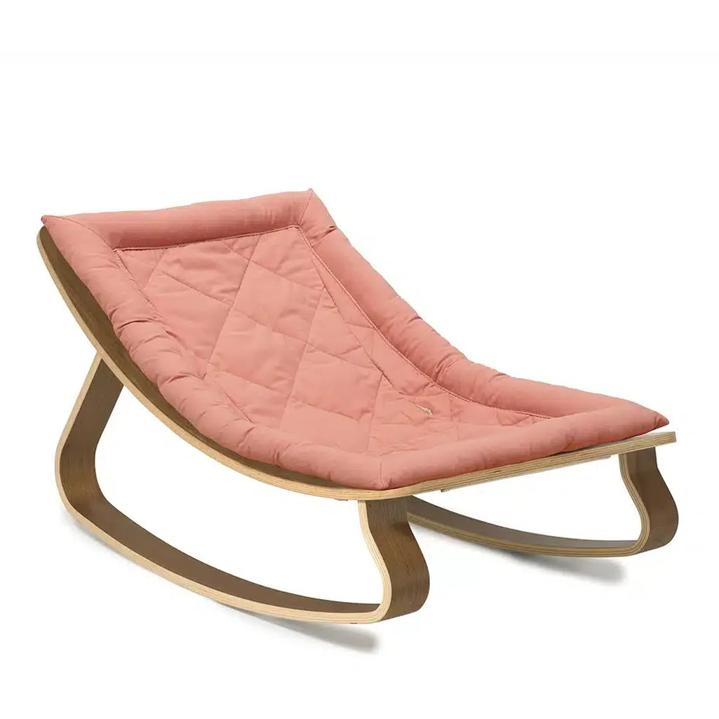 Studio detail shot of the Levo Rocker Walnut Wood by Charlie Crane in camel, emphasizing natural materials and infant use