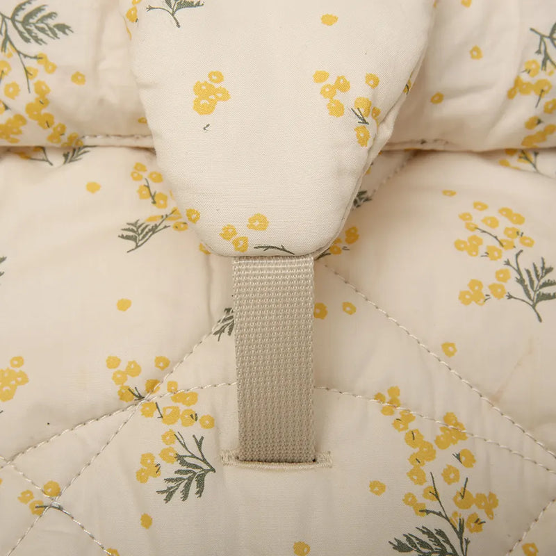 Soft milk fur upholstery shown on the Walnut Wood Levo Rocker by Charlie Crane, blending French design and infant safe comfort