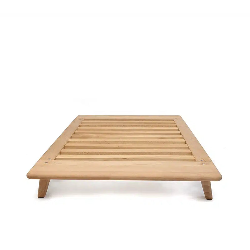wooden junior bed frame with rounded edges handmade in france by by charlie crane 